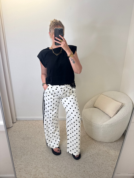 Pantalon à pois blanc