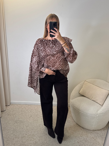 Blouse à motifs cape